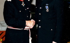 Receiving his long service medal